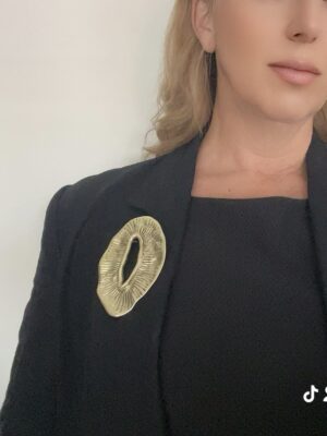 Broche Eclipse chapado dorado XXL.